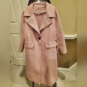 Solid One button Overcoat with pockets.
